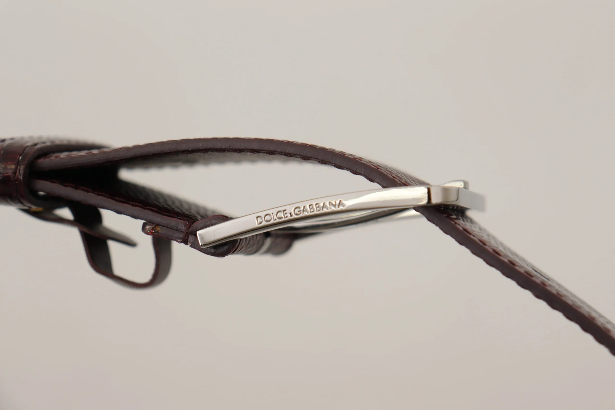 Elegant Maroon Leather Belt with Engraved Buckle