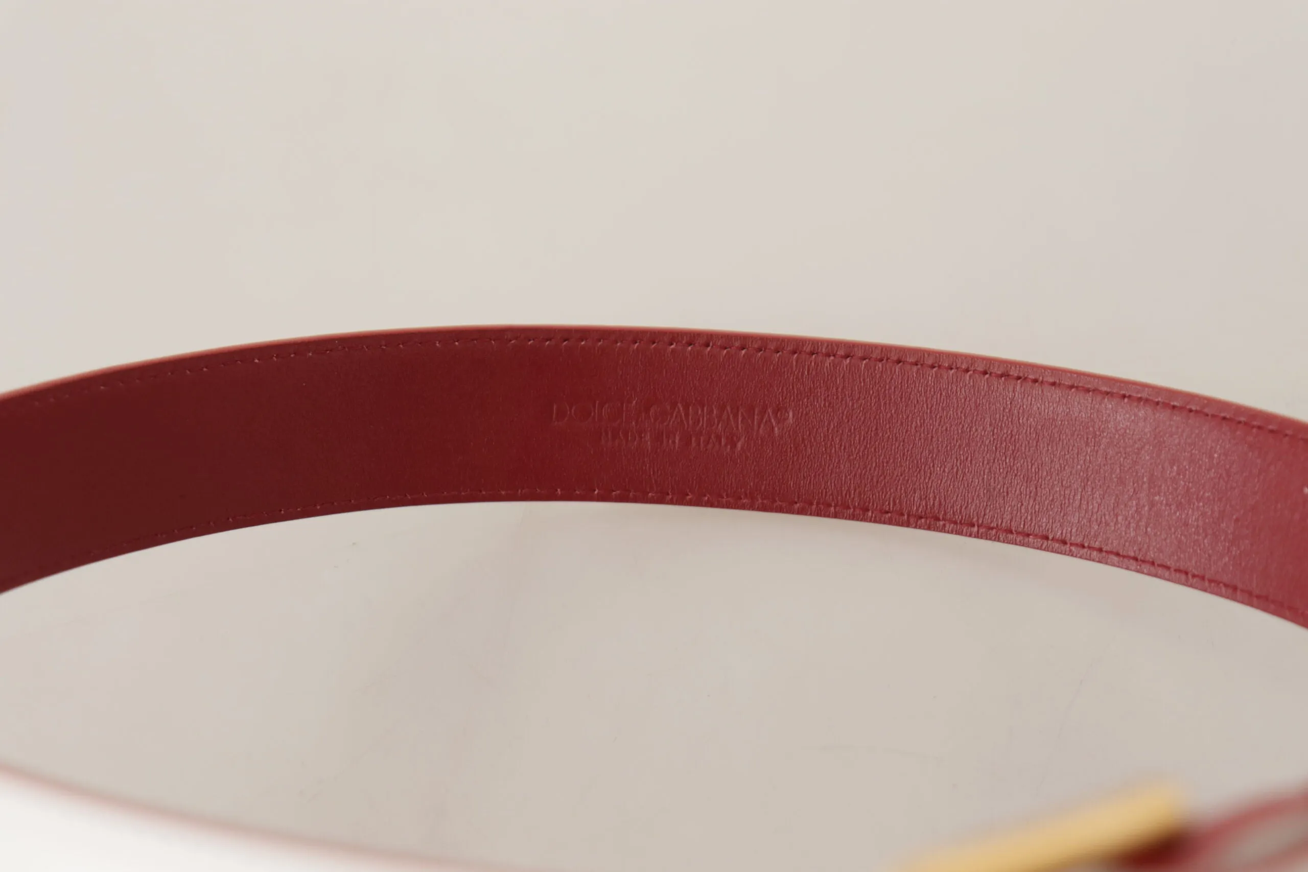 Elegant White Leather Belt with Engraved Buckle